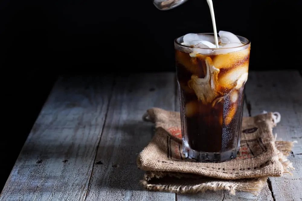 Delicious Iced Coffee in a tall glass - Make cold brew coffee instead of hot one that you let cool down?