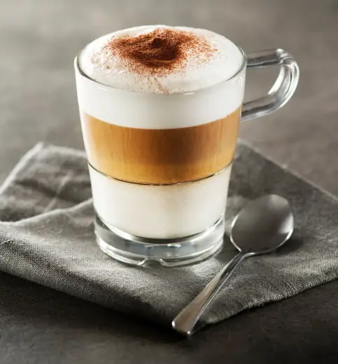 Glass of hot Latte macchiato coffee