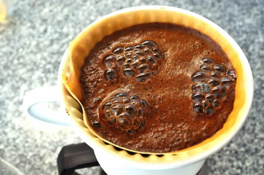 How does the coffee filter shape impact the taste of coffee