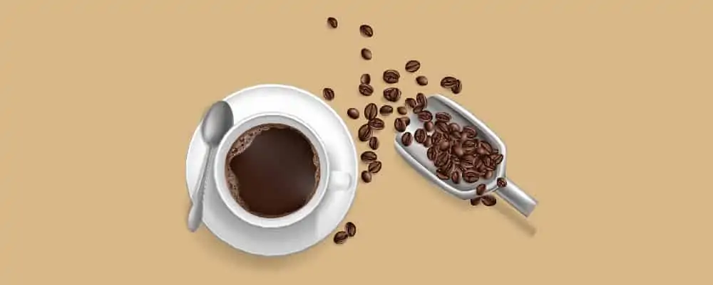 A cup of coffee with a scoop of coffee beans behind
