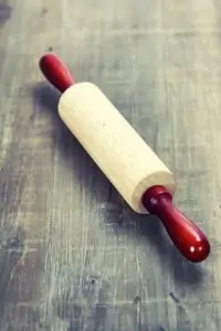 Grinding coffee beans with a rolling pin